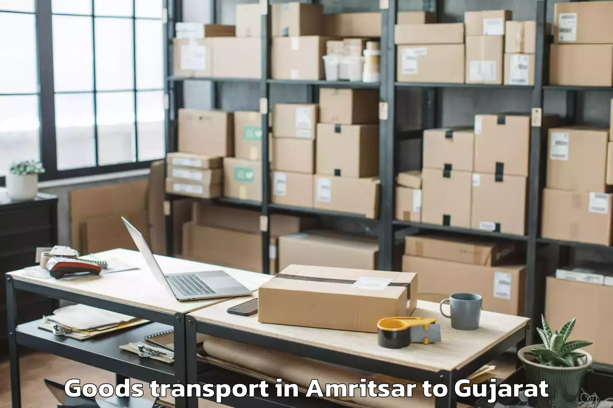 Reliable Amritsar to Vaghodia Ina Goods Transport